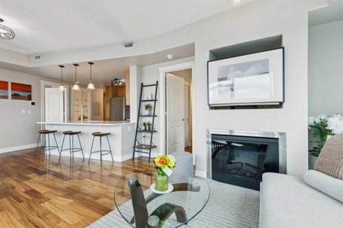 1701-836 15 Avenue, Calgary, AB - Indoor Photo Showing Living Room With Fireplace