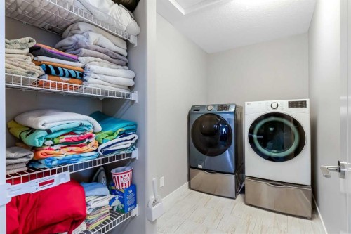 173 Auburn Sound Close Se, Calgary, AB - Indoor Photo Showing Laundry Room