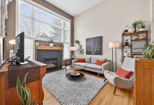 86 Inglewood Point Se, Calgary, AB - Indoor Photo Showing Living Room With Fireplace