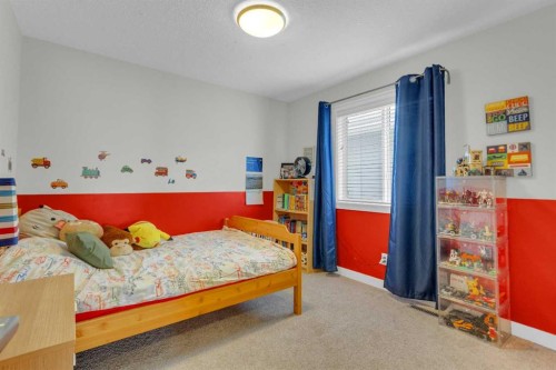 21 Masters Place Se, Calgary, AB - Indoor Photo Showing Bedroom