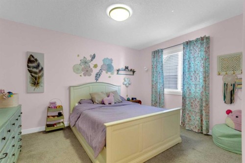 21 Masters Place Se, Calgary, AB - Indoor Photo Showing Bedroom