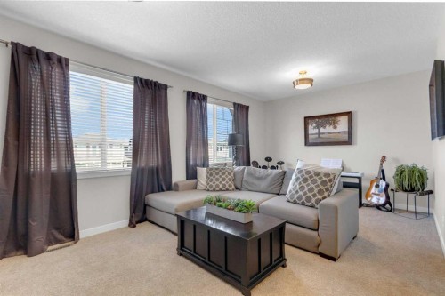 21 Masters Place Se, Calgary, AB - Indoor Photo Showing Living Room