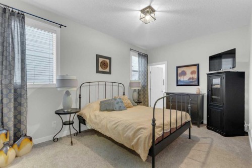 21 Masters Place Se, Calgary, AB - Indoor Photo Showing Bedroom