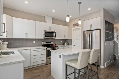 265 Seton Circle Se, Calgary, AB - Indoor Photo Showing Kitchen With Stainless Steel Kitchen With Double Sink With Upgraded Kitchen