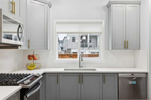 27 Masters Manor Se, Calgary, AB - Indoor Photo Showing Kitchen With Upgraded Kitchen