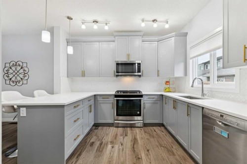 27 Masters Manor Se, Calgary, AB - Indoor Photo Showing Kitchen With Upgraded Kitchen