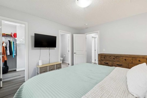 27 Masters Manor Se, Calgary, AB - Indoor Photo Showing Bedroom