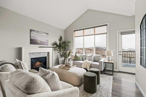 106-55 Fireside Circle, Cochrane, AB - Indoor Photo Showing Living Room With Fireplace