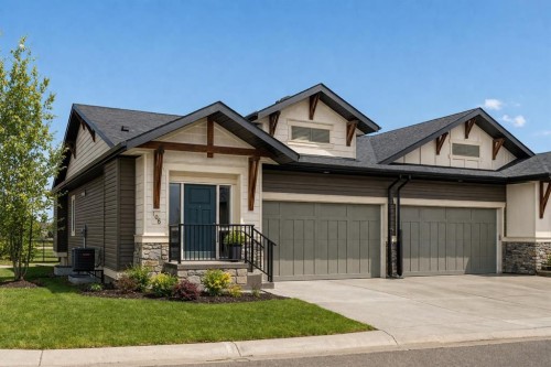 106-55 Fireside Circle, Cochrane, AB - Outdoor With Facade