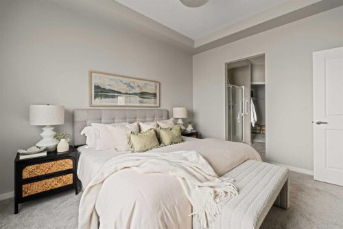 106-55 Fireside Circle, Cochrane, AB - Indoor Photo Showing Bedroom