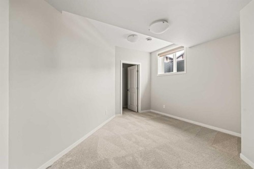 106-55 Fireside Circle, Cochrane, AB - Indoor Photo Showing Other Room