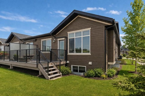 106-55 Fireside Circle, Cochrane, AB - Outdoor With Deck Patio Veranda