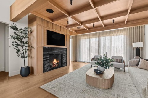 6 Stanley Crescent Sw, Calgary, AB - Indoor Photo Showing Living Room With Fireplace