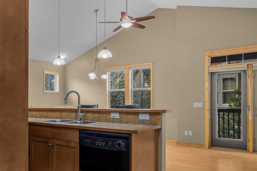 202-70 Dyrgas Gate, Canmore, AB - Indoor Photo Showing Kitchen With Double Sink