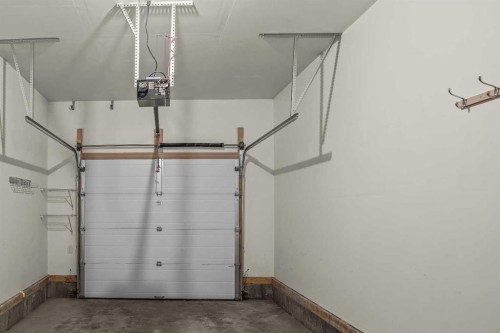 202-70 Dyrgas Gate, Canmore, AB - Indoor Photo Showing Garage