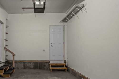 202-70 Dyrgas Gate, Canmore, AB - Indoor Photo Showing Garage