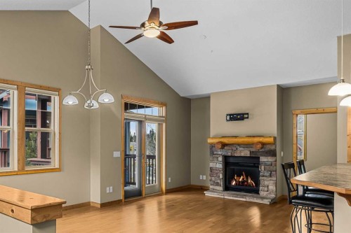 202-70 Dyrgas Gate, Canmore, AB - Indoor Photo Showing Living Room With Fireplace