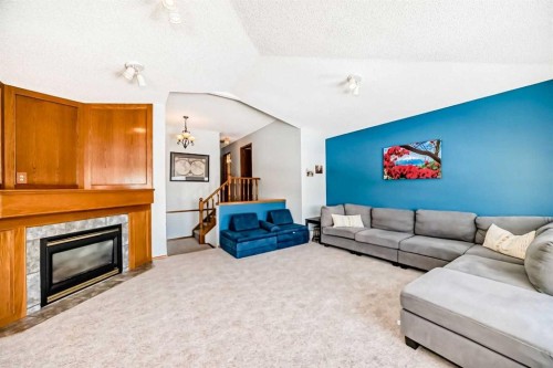 15 Citadel Meadow Grove Nw, Calgary, AB - Indoor Photo Showing Living Room With Fireplace