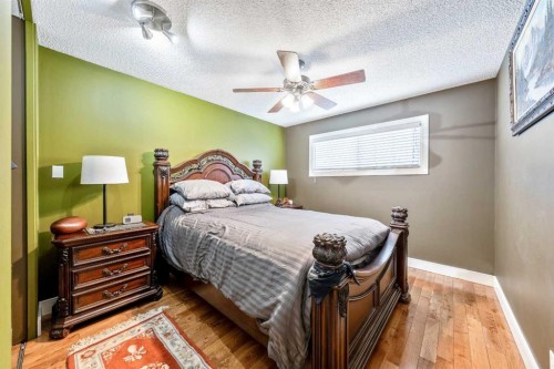 28 Riverbirch Place Se, Calgary, AB - Indoor Photo Showing Bedroom