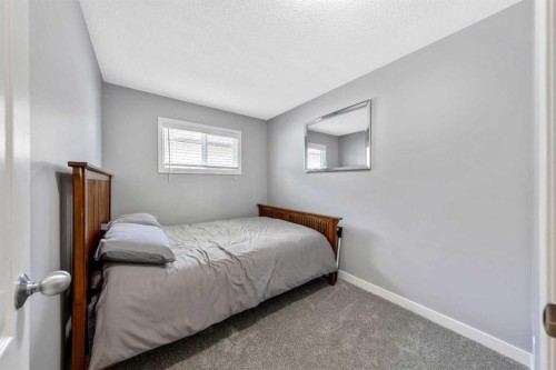 28 Riverbirch Place Se, Calgary, AB - Indoor Photo Showing Bedroom