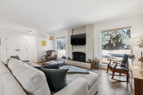 931 Parkwood Drive Se, Calgary, AB - Indoor Photo Showing Living Room With Fireplace