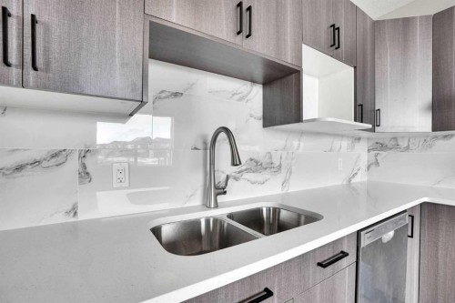 47 Corner Meadows Row Ne, Calgary, AB - Indoor Photo Showing Kitchen With Double Sink