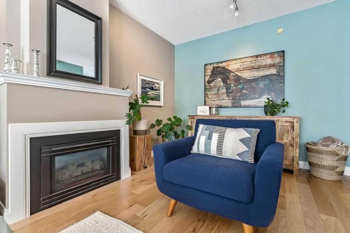 119 Citadel Lane Nw, Calgary, AB - Indoor Photo Showing Living Room With Fireplace