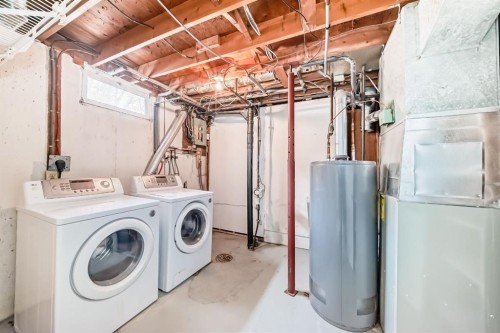 1277 Lake Sylvan Drive Se, Calgary, AB - Indoor Photo Showing Laundry Room