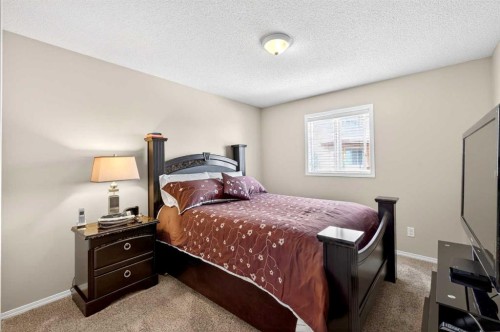 238 Royal Birch View Nw, Calgary, AB - Indoor Photo Showing Bedroom