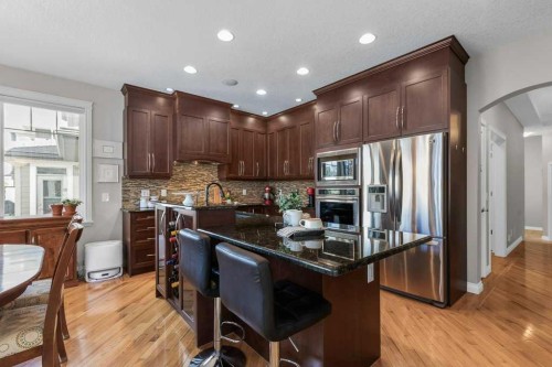 279 Coopers Hill Sw, Airdrie, AB - Indoor Photo Showing Kitchen With Upgraded Kitchen