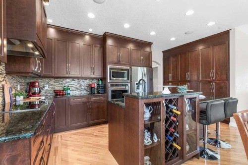 279 Coopers Hill Sw, Airdrie, AB - Indoor Photo Showing Kitchen With Upgraded Kitchen