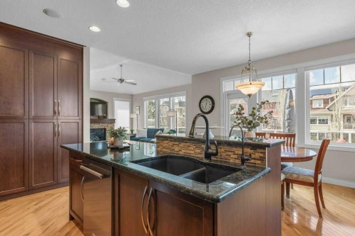 279 Coopers Hill Sw, Airdrie, AB - Indoor Photo Showing Kitchen With Double Sink With Upgraded Kitchen
