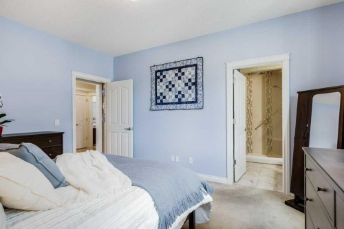 279 Coopers Hill Sw, Airdrie, AB - Indoor Photo Showing Bedroom