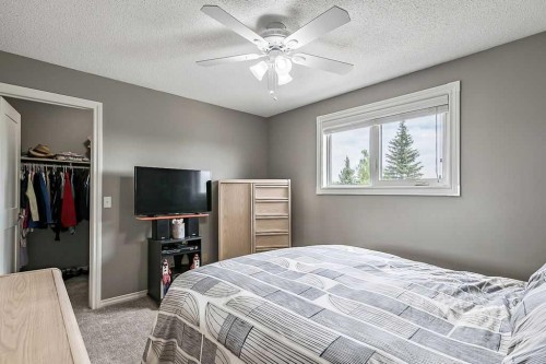 141 Shawfield Way Sw, Calgary, AB - Indoor Photo Showing Bedroom
