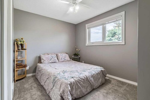 141 Shawfield Way Sw, Calgary, AB - Indoor Photo Showing Bedroom