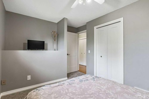 141 Shawfield Way Sw, Calgary, AB - Indoor Photo Showing Bedroom