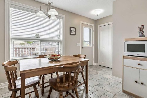 141 Shawfield Way Sw, Calgary, AB - Indoor Photo Showing Dining Room