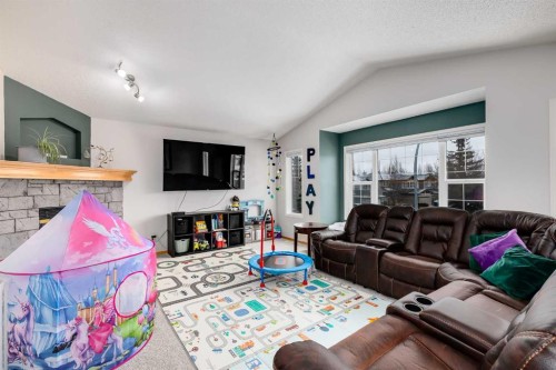 96 Chapala Square Se, Calgary, AB - Indoor Photo Showing Living Room