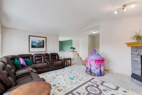 96 Chapala Square Se, Calgary, AB - Indoor Photo Showing Living Room