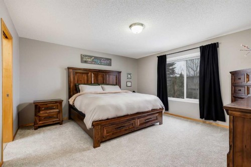 96 Chapala Square Se, Calgary, AB - Indoor Photo Showing Bedroom