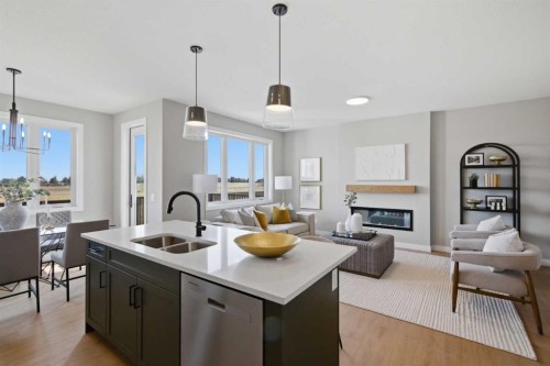 147 Belvedere Crescent Se, Calgary, AB - Indoor Photo Showing Kitchen With Fireplace With Double Sink With Upgraded Kitchen