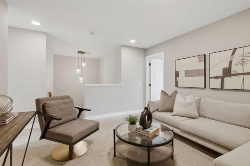 147 Belvedere Crescent Se, Calgary, AB - Indoor Photo Showing Living Room