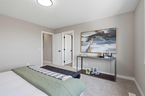 147 Belvedere Crescent Se, Calgary, AB - Indoor Photo Showing Bedroom