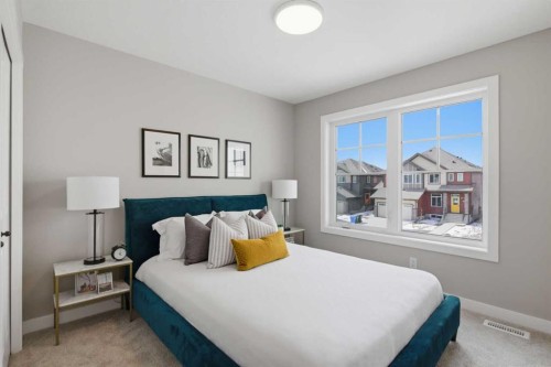 147 Belvedere Crescent Se, Calgary, AB - Indoor Photo Showing Bedroom