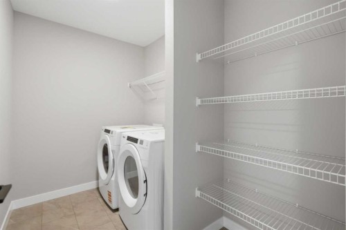 147 Belvedere Crescent Se, Calgary, AB - Indoor Photo Showing Laundry Room