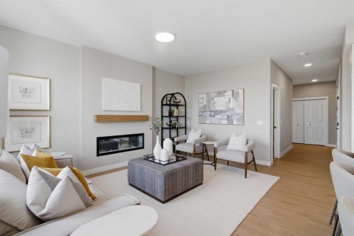 147 Belvedere Crescent Se, Calgary, AB - Indoor Photo Showing Living Room With Fireplace