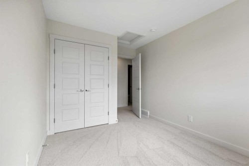 12 Waterford Glen, Chestermere, AB - Indoor Photo Showing Other Room