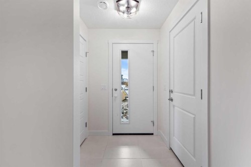 12 Waterford Glen, Chestermere, AB - Indoor Photo Showing Other Room