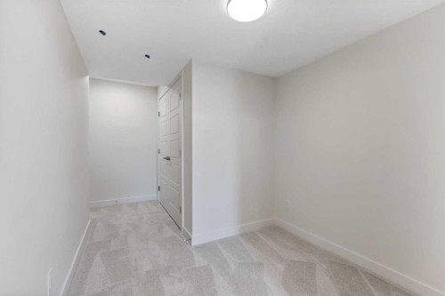 12 Waterford Glen, Chestermere, AB - Indoor Photo Showing Other Room