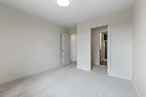 12 Waterford Glen, Chestermere, AB - Indoor Photo Showing Other Room
